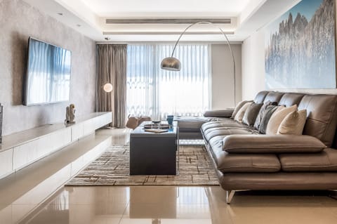 Beautiful and Spacious Living Room: 
• 70” Smart TV
• Great View from Window