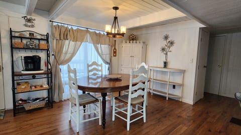 Dining area. Beautiful view of backyard through large window. 
