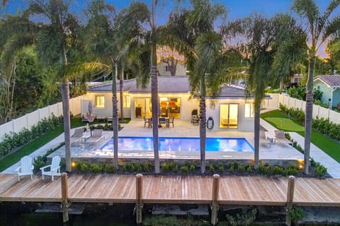 Escape to this idyllic lakefront home, where nature`s splendor converges with modern luxury and endless possibilities.