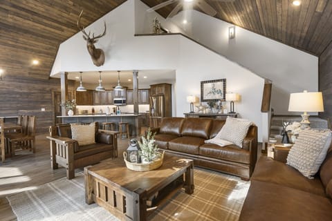 Vaulted living, kitchen, and dining spaces