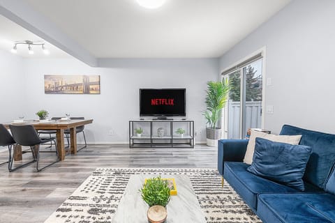 Relax in our cozy living room featuring a 50` TV, complete with Netflix and an Android box for all your entertainment needs.
