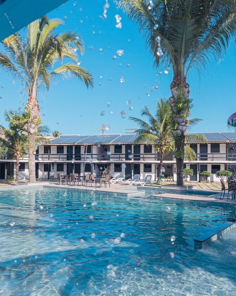 2 outdoor pools, open 9:00 AM to 10:00 PM, pool umbrellas, sun loungers