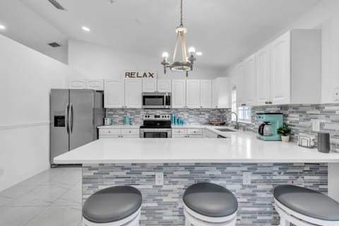 Indoors, Kitchen, Microwave, Refrigerator, Cooktop