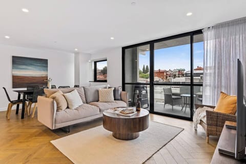 Natural light floods the space, creating a warm and inviting atmosphere for relaxation. 