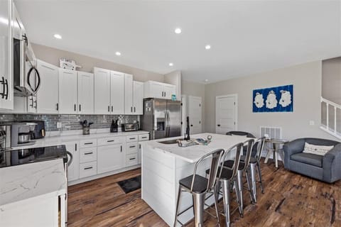 Chef's Kitchen has Quartz Countertops and Stainless Appliances.