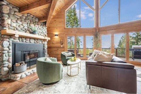 Living room with a view and wood-burning stove