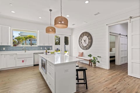 Cozy living area w/ TV, comfortable sofas, and a relaxed gathering space.