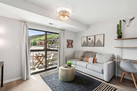 Living Room with Pull Out Queen Sofa Sleeper - Workstation