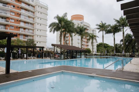 2 outdoor pools, open 8:00 AM to 10:00 PM, pool umbrellas, sun loungers