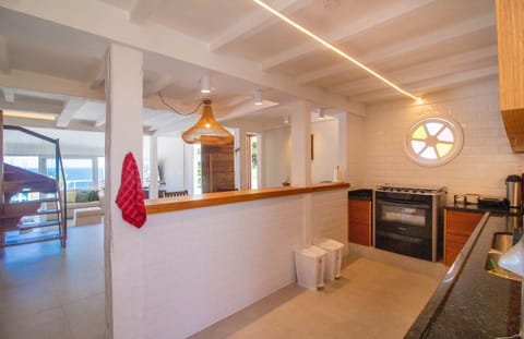 Villa | Private kitchen | Full-size fridge, microwave, oven, dishwasher