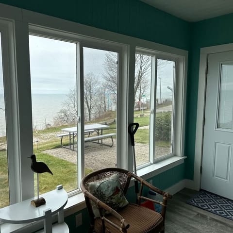 Bask in natural light in our cozy sunroom—your go-to space for morning coffee, reading, or simply soaking up peaceful vibes. Surrounded by windows and filled with warmth, it’s the perfect spot to relax, recharge, and enjoy the beauty of the day. ☀️🪟