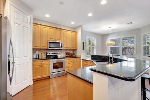 Our kitchen has granite counters and stainless steel appliances