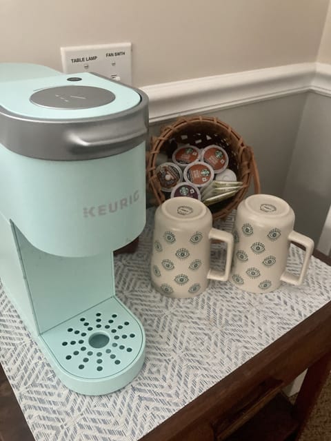 Keurig coffee maker with a starter set of coffee pods.