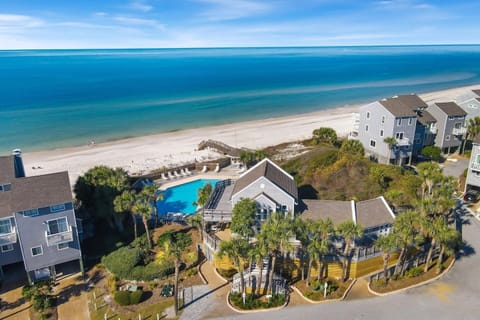 Wade in at your own pace — the Gulf beach is yours the moment you cross the boardwalk.