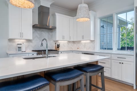 Custom cabinets and tiled backsplash
