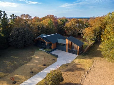 Inviting front exterior of the home, featuring a well-maintained entrance, charming landscaping, and a welcoming atmosphere that sets the tone for the rest of the property.