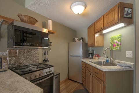 The kitchen is small but fully functional.