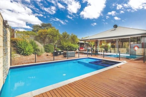 Amazing family entertaining area with gas heated in-ground spa, pool and covered verandah with Weber barbeque. 