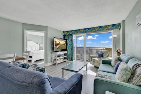 Signature Condo, 3 Bedrooms, Balcony, Ocean View | Living room | 65-inch Smart TV with cable channels
