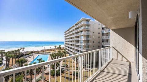 Seaside Beach & Racquet Club 5517 - Private balcony offering scenic views of the pool and beach — a perfect spot to enjoy the coastal breeze.