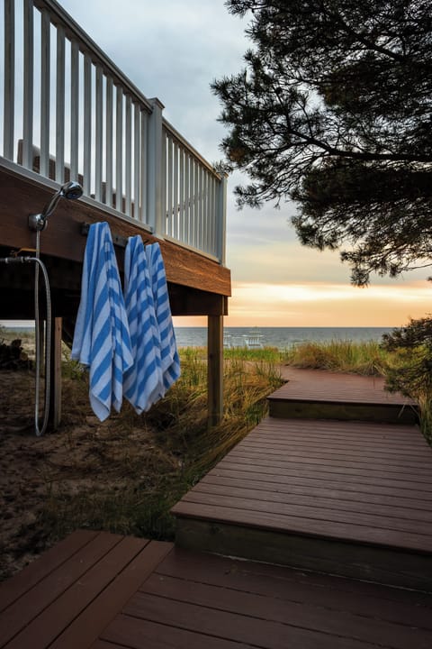 Clean off extra sand from the beach with the outdoor shower!