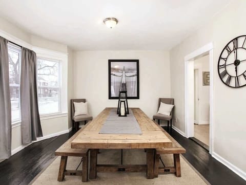 Bright dining space with large table for gatherings.