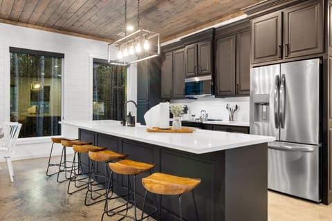 Kitchen with plenty of barstool seating