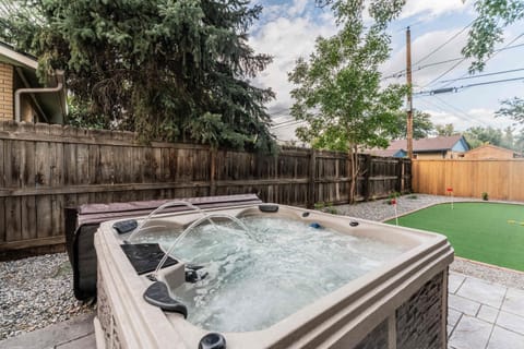 The four-person hot tub is the perfect place to soak after a long day.