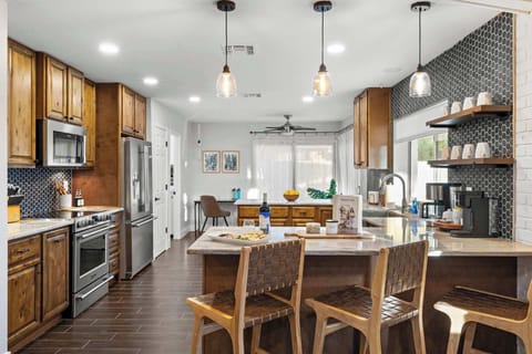 Remodeled kitchen is well equipped with everything you may need to cook or bake!Sit up breakfast counter.