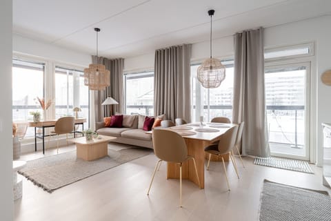 Deluxe Apartment | Living area | 60-inch LED TV with cable channels, heated floors