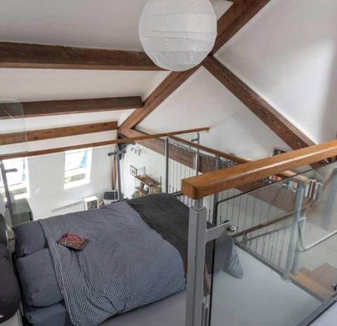 Large upstairs sleeping area with a comfy bed, lovely high ceilings and original solid beams. Fresh towels and linen provided for every stay