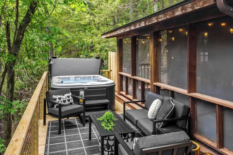 Soak away your stress in the private hot tub while surrounded by the peaceful sights and sounds of the forest. This secluded deck offers a quiet sanctuary to unwind after a day of exploring downtown Eureka Springs.