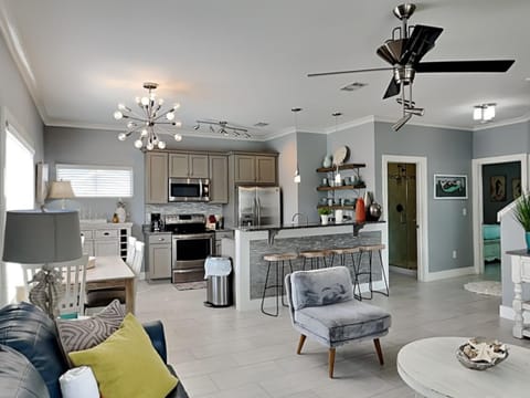 House, Multiple Beds, Balcony, Pool View | Living area | 40-inch flat-screen TV with cable channels, TV