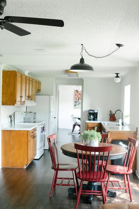 Fully stocked galley kitchen connected to each living area for entertaining.