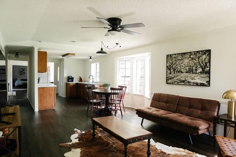 Second angle of living room 2/2 including view into the kitchen.