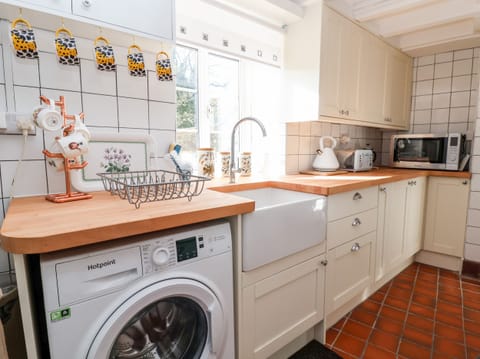 Fridge, electric kettle, toaster, cookware/dishes/utensils