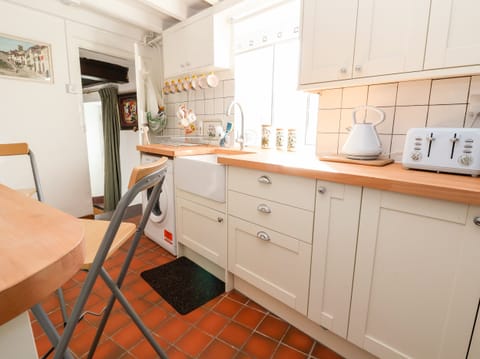 Fridge, electric kettle, toaster, cookware/dishes/utensils