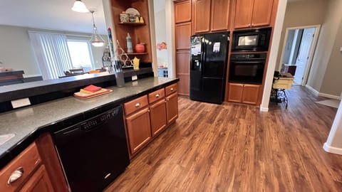 A kitchen with all the amenities.