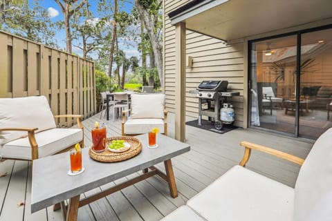 Relax on the tranquil, spacious patio offering picturesque views of the 6th hole from this end-unit villa, or unwind by the pool or on the nearby beach, just .4 miles away along a beautiful trail.