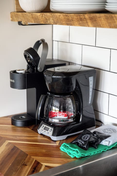 Start your morning w/ a fresh pot of coffee in this convenient kitchen setup.
