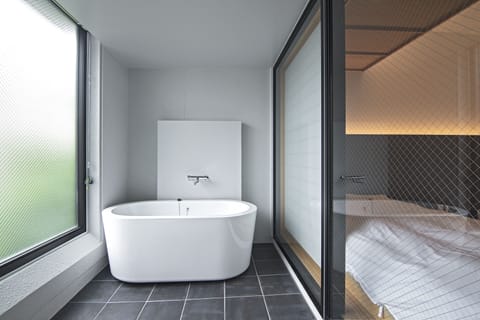 Exclusive Triple Room | Bathroom | Combined shower/tub, rainfall showerhead, free toiletries, hair dryer