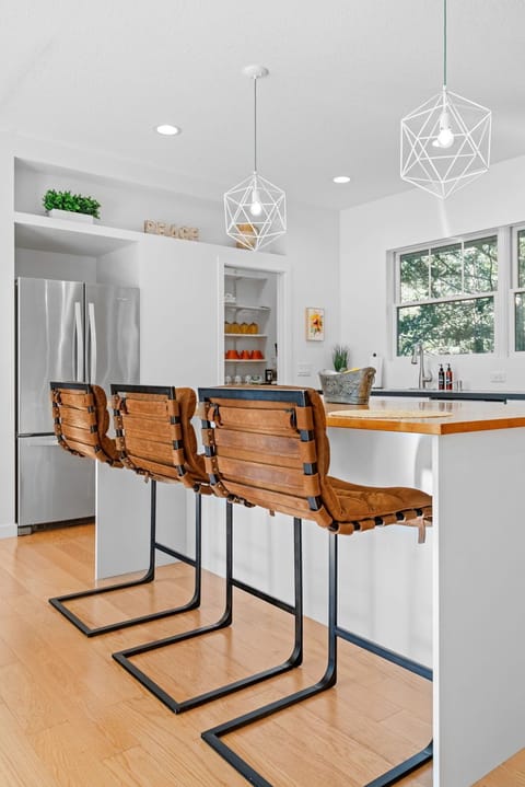 Your modern kitchen features stylish bar seating and everything you need to cook at home.