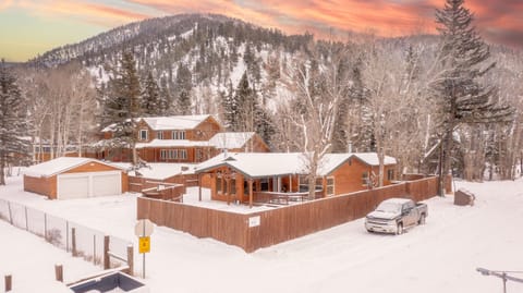 Drone view of this incrediable 3 bed 3 bath right in town, single story with parking.