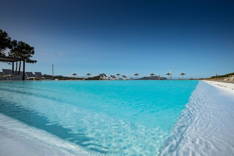 Outdoor pool, open 8:00 AM to 8:00 PM, pool umbrellas, sun loungers