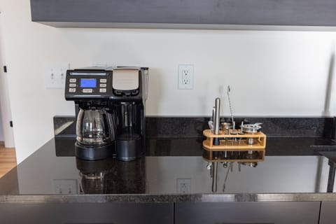Basement Level: Coffee Machine & Cocktail Shaker at Kitchenette in Family Room