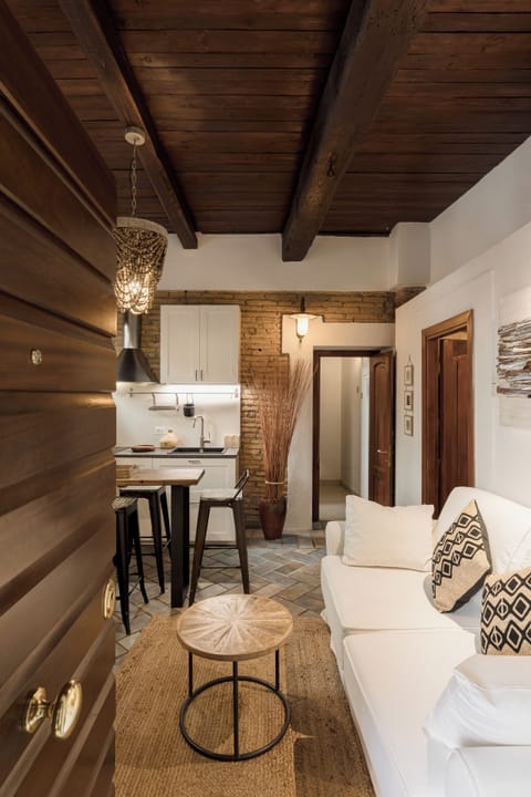 Luxury Apartment, 1 Bedroom | Living area | 50-inch flat-screen TV with cable channels