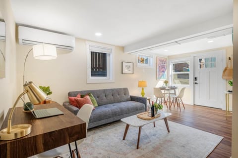 One of two living room spaces. This convertible sofa offers you extra sleeping space.