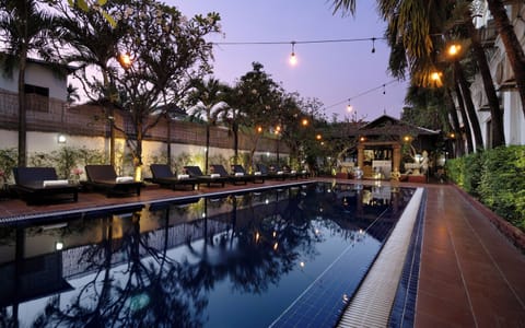 Outdoor pool, open 9:00 AM to 9:00 PM, sun loungers
