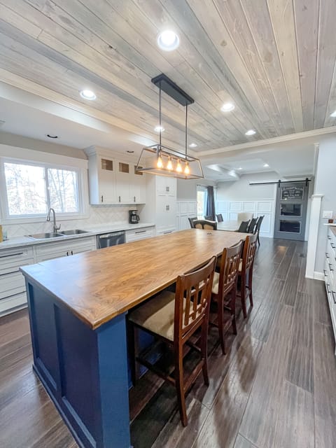 Bar seating as well as 8 seat dinner table 
