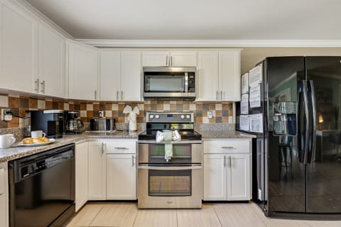 Step into our well-appointed kitchen, a haven for culinary enthusiasts and family gatherings alike.